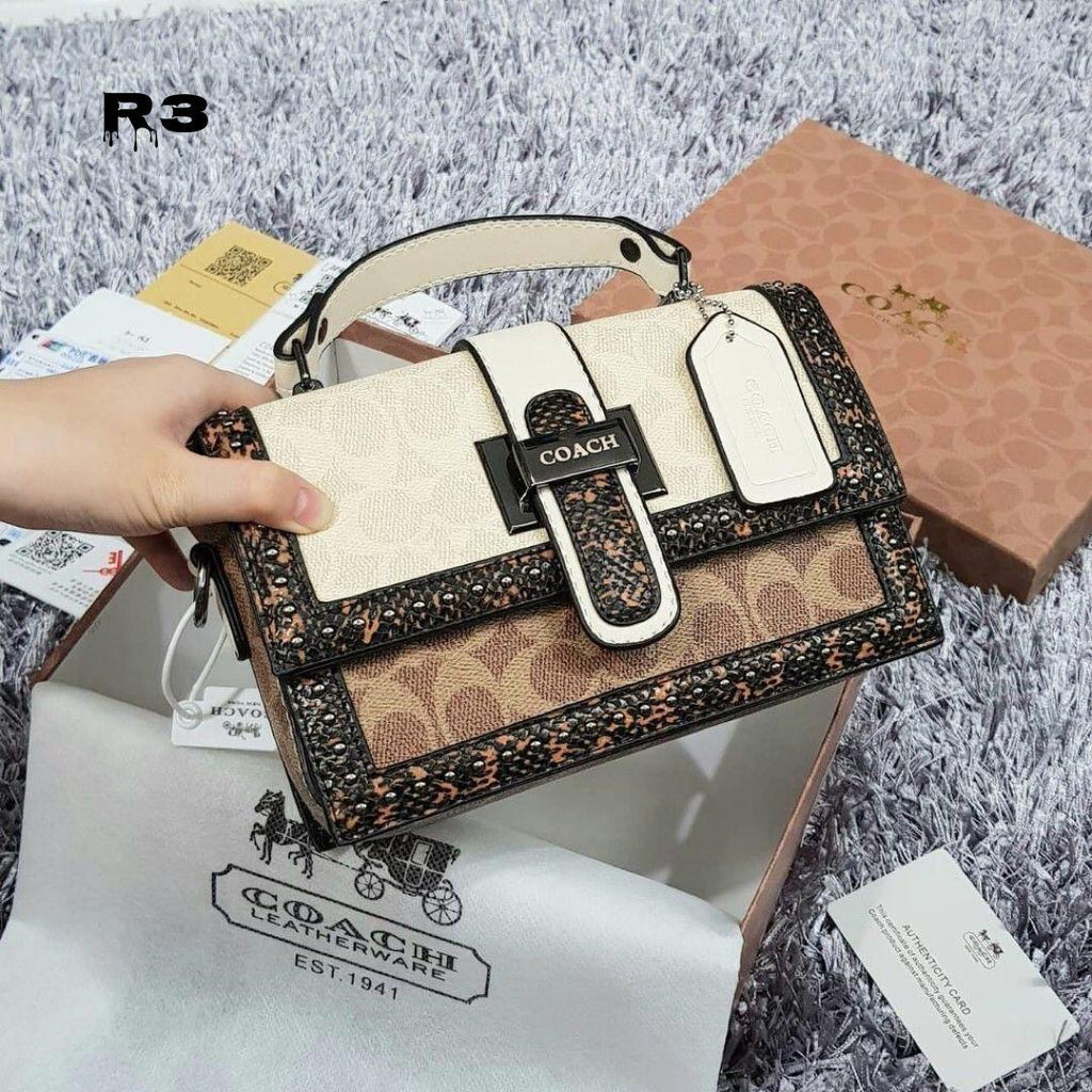 Coach Studd Sling Bag