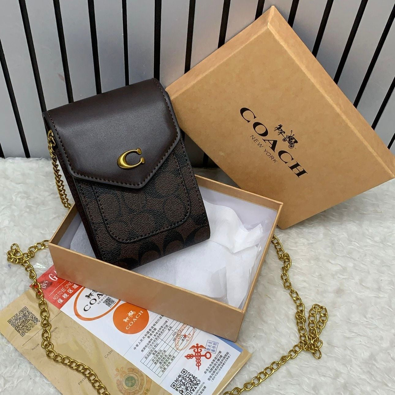 Coach Mobile Sling