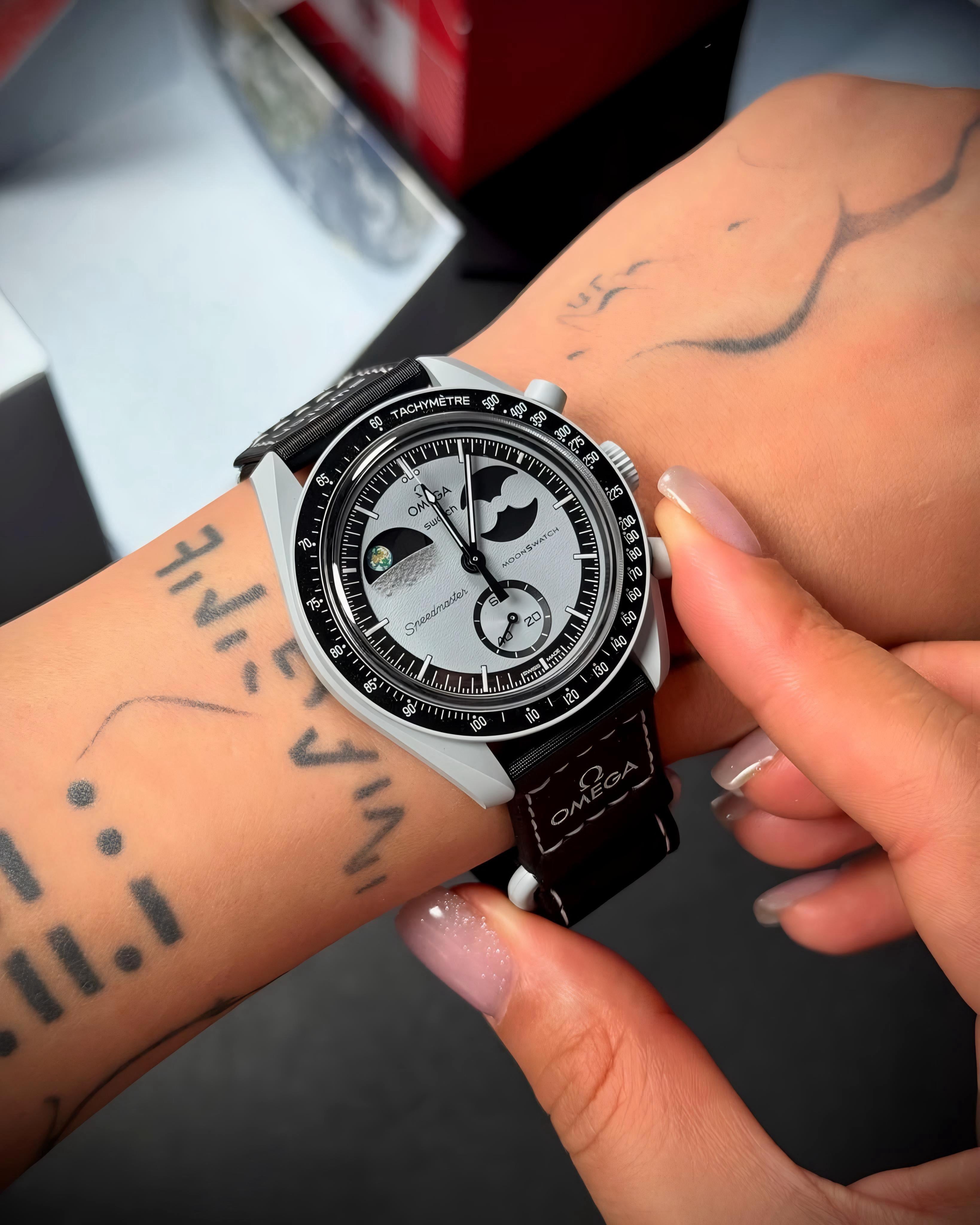 Omega Swatch Speedmaster Moonswatch - Mission to the EarthPhase