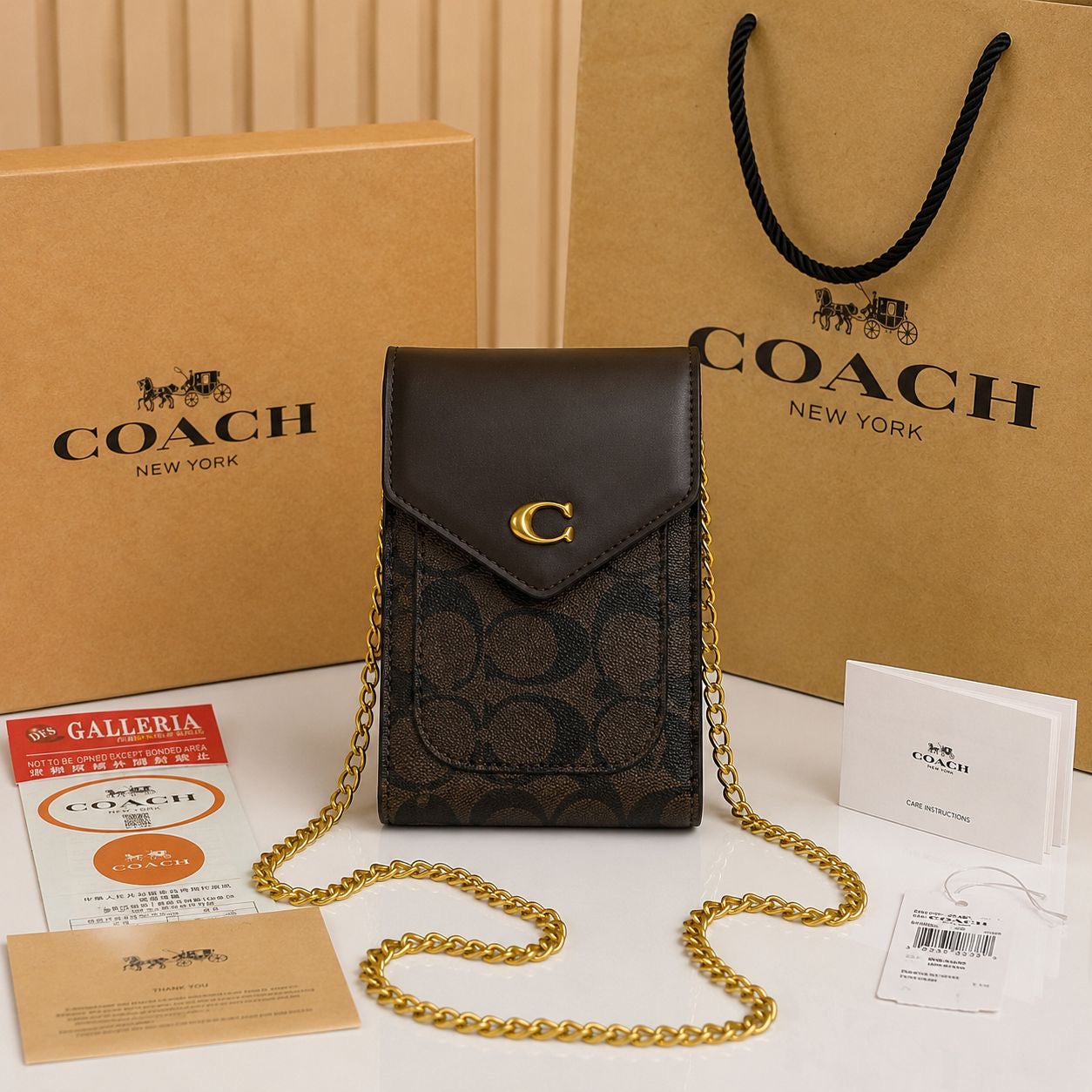 Coach Mobile Sling