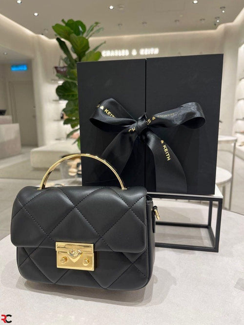 Charles & Keith Boxy Quilted Top Handle Bag