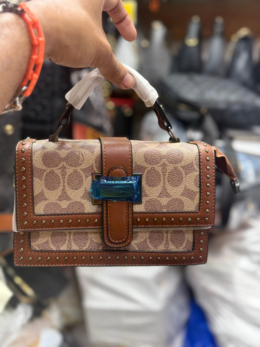 Coach Studd Sling Bag