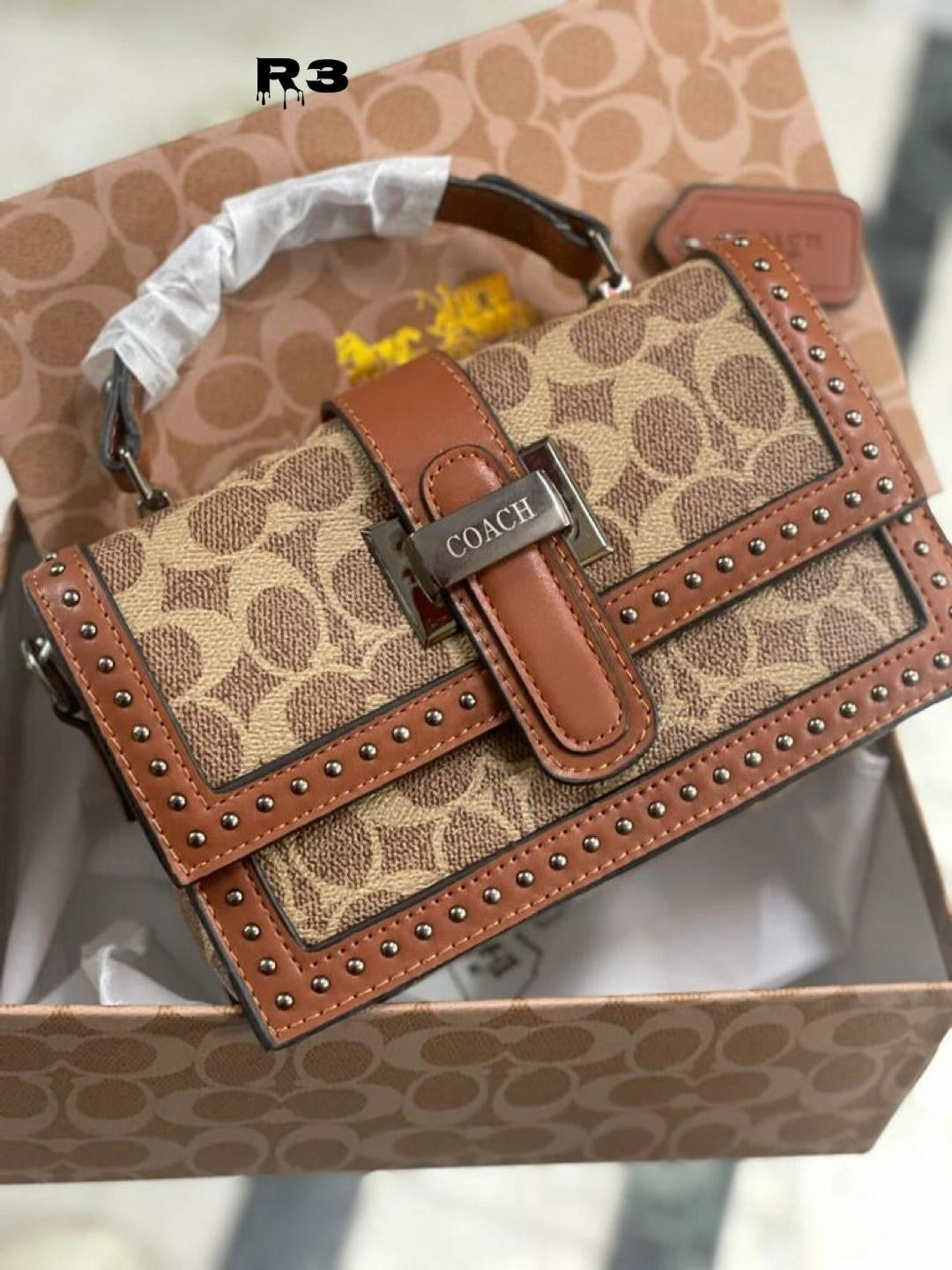 Coach Studd Sling Bag