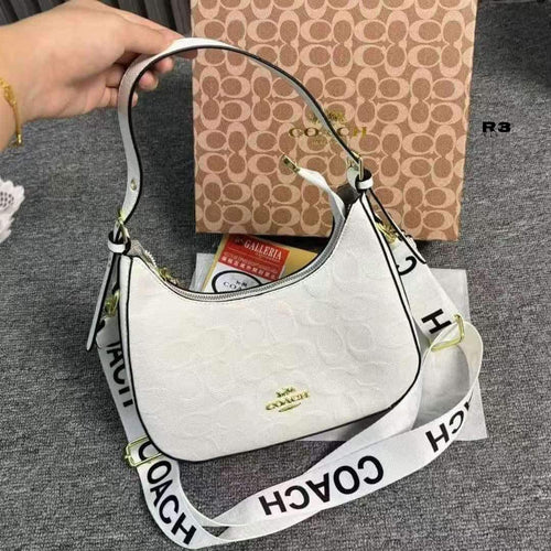 Coach Emboss Hobo Mini Crossbody Bag