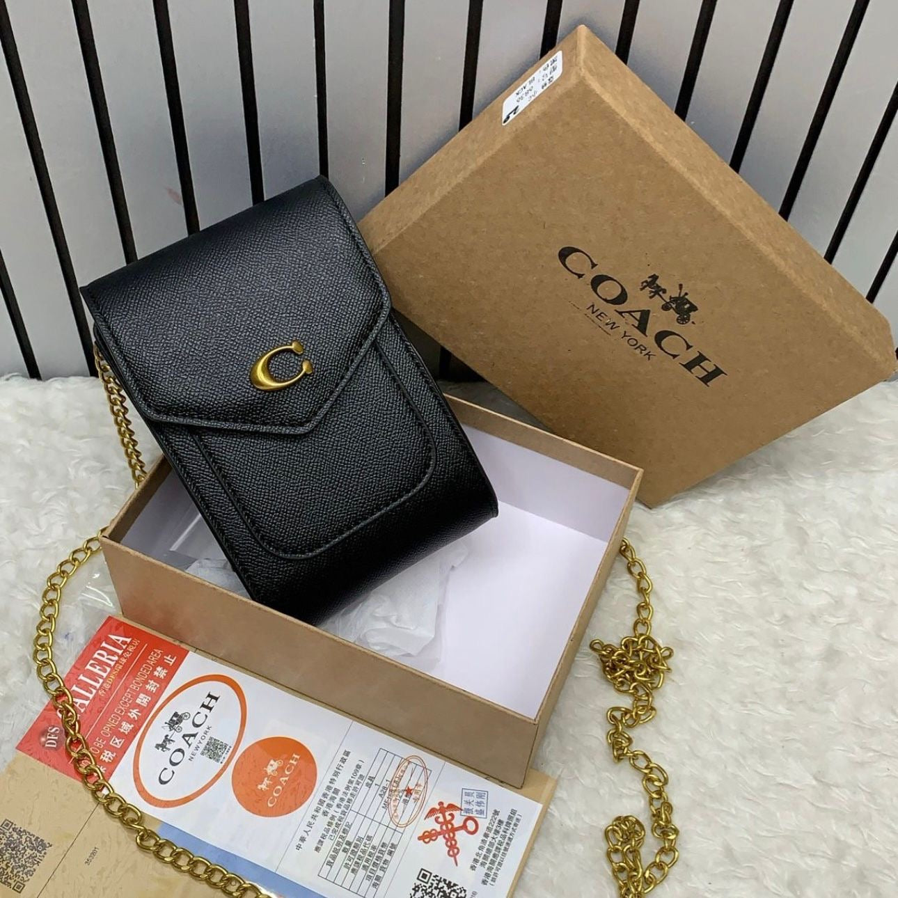 Coach Mobile Sling