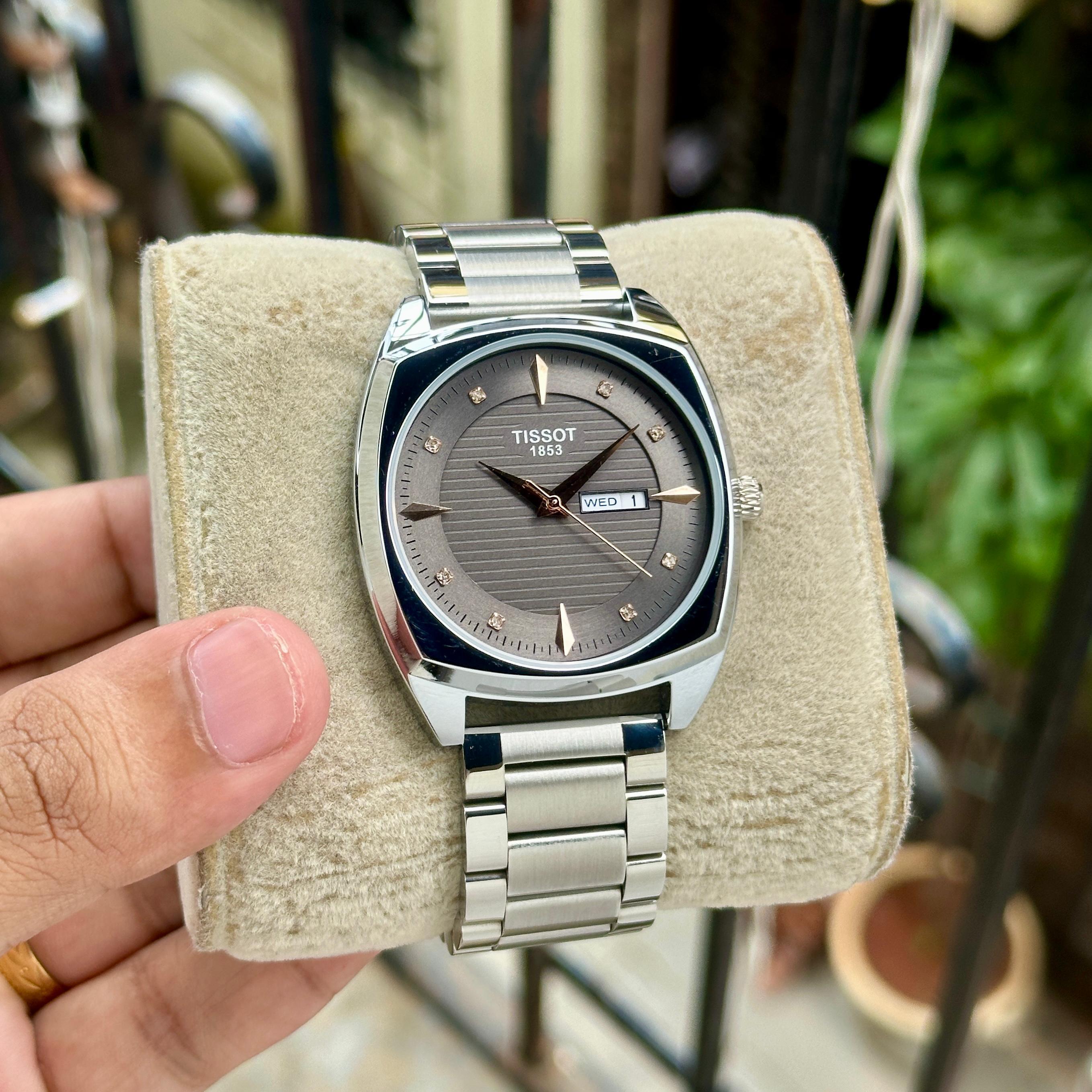 Tissot Rectangular Day Date Watch